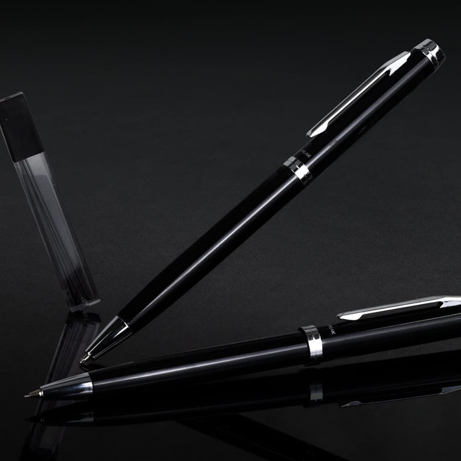 A black pen and pencil set with a sleek design, featuring metallic accents and a clear display case.