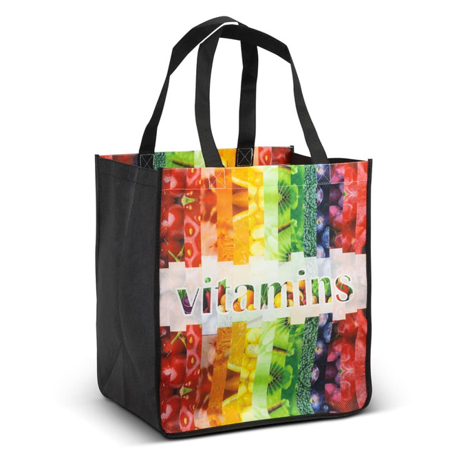 A tote bag featuring a vibrant design with various fruits and vegetables in bright colours, along with a logo.