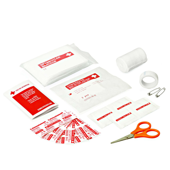 A first aid kit featuring various bandages, gauze, scissors, safety pins, and adhesive tape, in a red and white design.