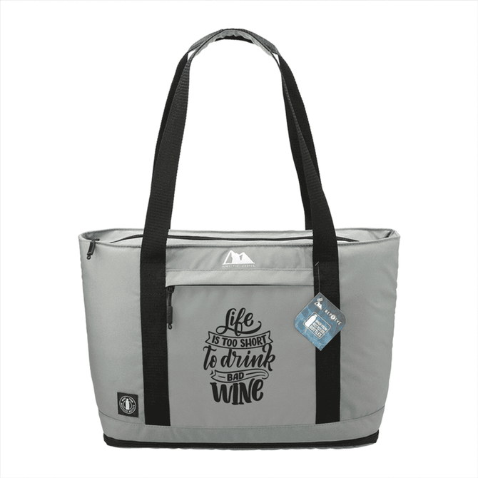 A grey cooler bag with black straps, featuring a logo and a message about wine.