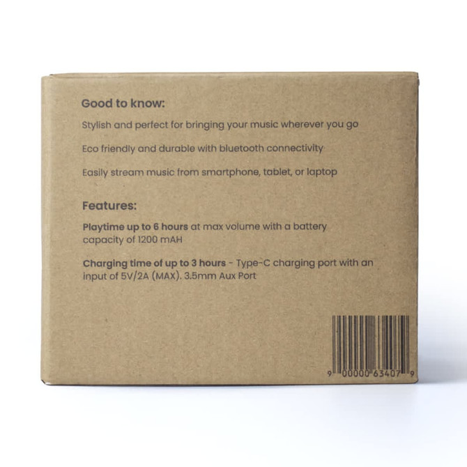 A brown box containing the Boomer Bamboo Wireless Speaker with features and specifications listed on the back.
