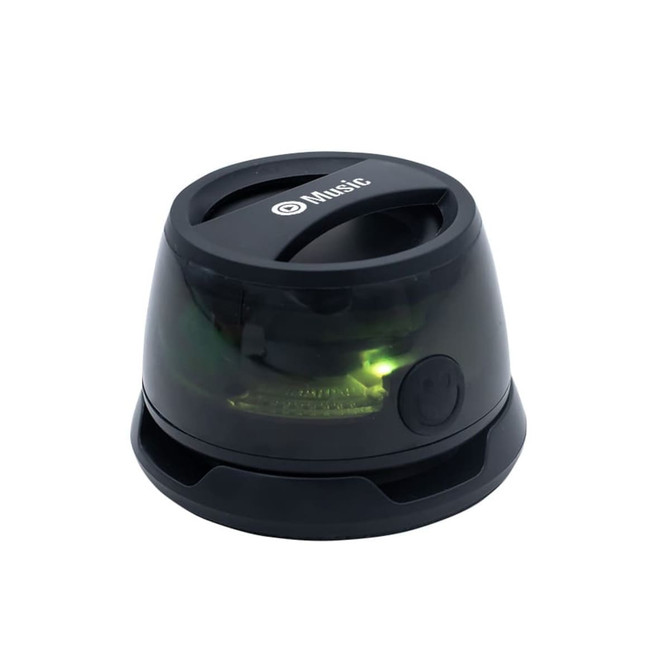 A compact black speaker with a transparent top and subtle green light inside. It features a branding logo.