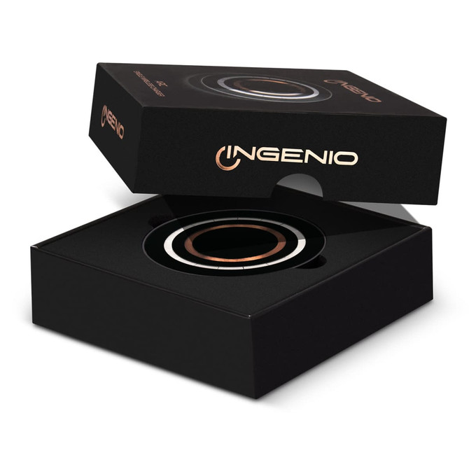 A black box containing a circular, wireless charger with a sleek design, featuring a branding logo.
