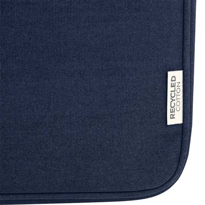 A dark navy recycled canvas laptop sleeve with a small tag indicating recycled cotton.