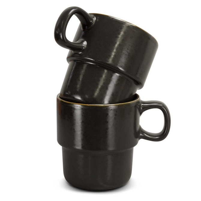 A stack of two black ceramic coffee mugs with a glossy finish and golden rims, featuring handles.
