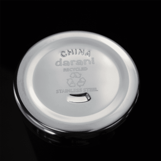 A drink bottle lid made of polished stainless steel, featuring a logo and recycling symbol.