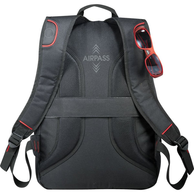 A black backpack with red accents and sunglasses resting on one strap. It features padded back support and has a logo.