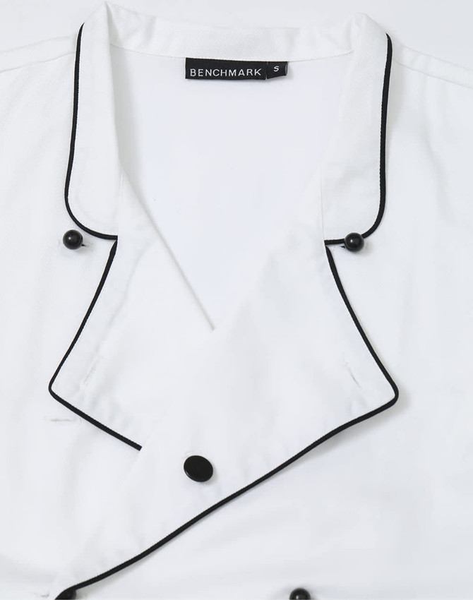 A white unisex executive chef jacket with black piping and buttons, featuring a collar design.