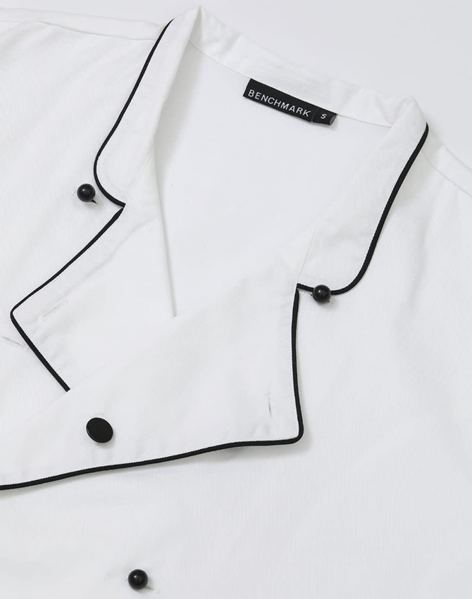 A white unisex executive chef jacket with black piping and buttons, featuring a branded label.
