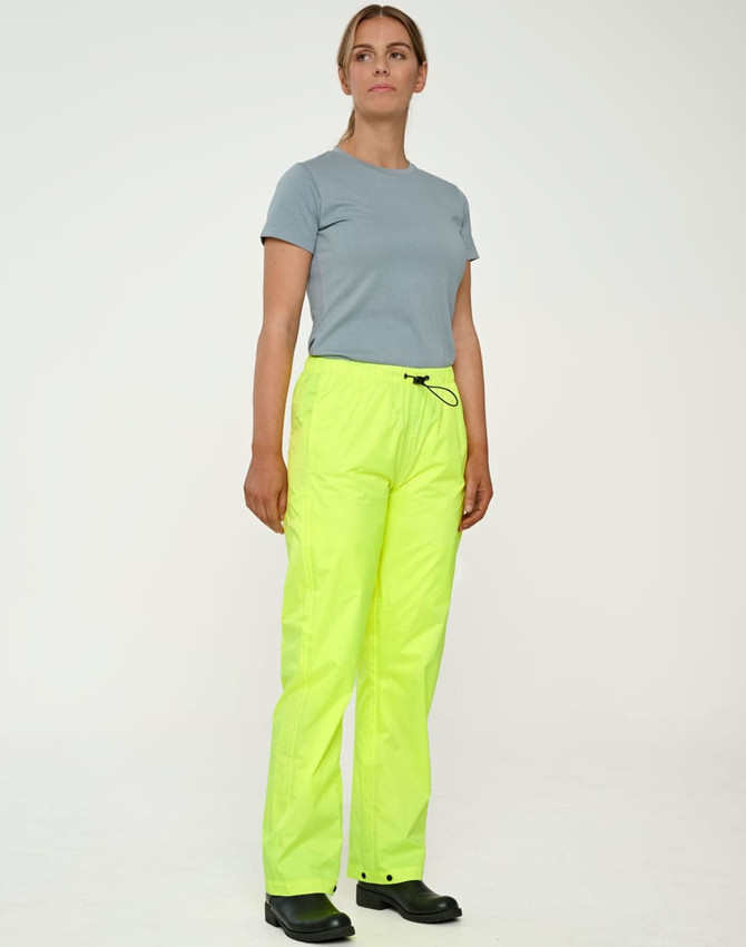 Lightweight nylon waterproof rain pants in bright neon yellow, featuring an elastic waistband and a casual fit.