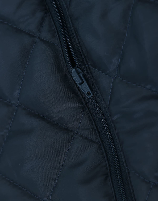 A unisex quilted waterproof jacket in navy blue, featuring a zip opening and a textured fabric design.