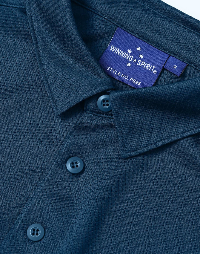 A navy blue men's sustainable jacquard knit short sleeve polo with a branded label and button details.