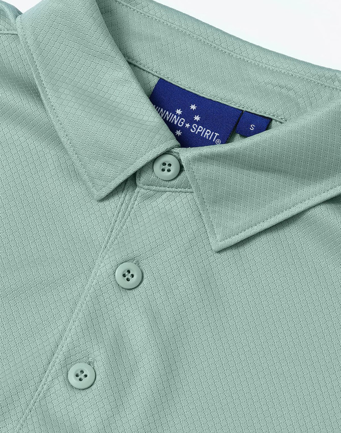 A light green sustainable jacquard knit short-sleeve polo shirt featuring a collar and buttons, with a logo.