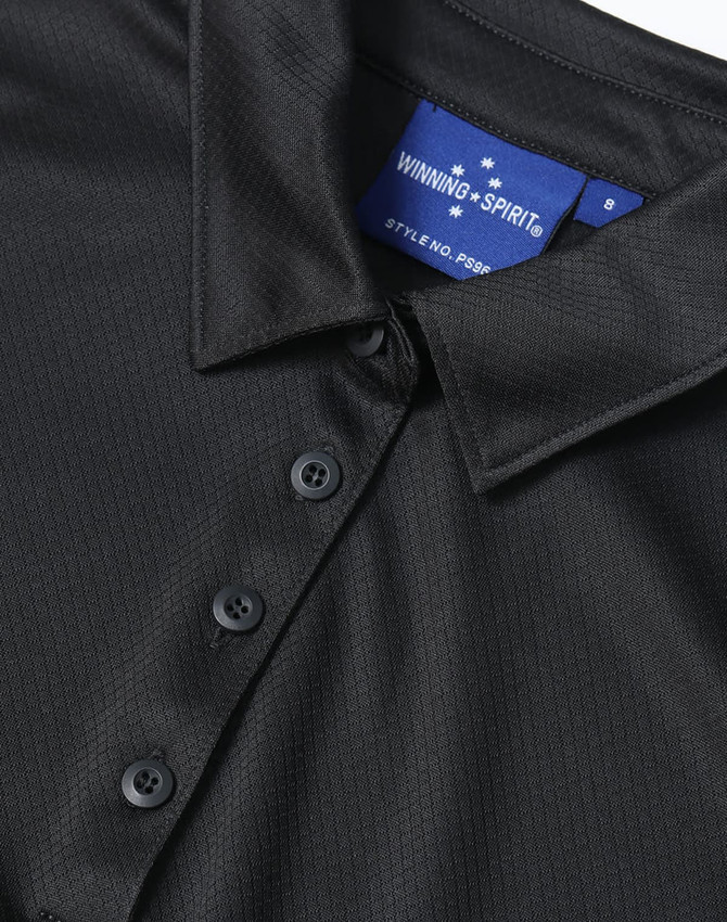 A black ladies' sustainable jacquard knit short-sleeve polo featuring a collared neckline and buttons, with a branding tag.