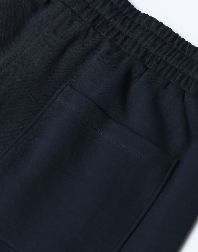 Unisex Airlayered CVC sweatpants in navy blue, featuring an elastic waistband and a back pocket.
