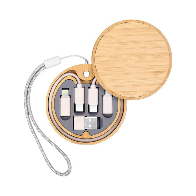 A bamboo round case containing a 15W wireless charger and various charging cables in silver and white.