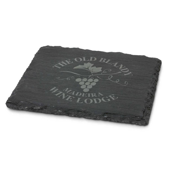 A single slate coaster in dark grey with a grapevine design and a logo. Edges are textured and natural.