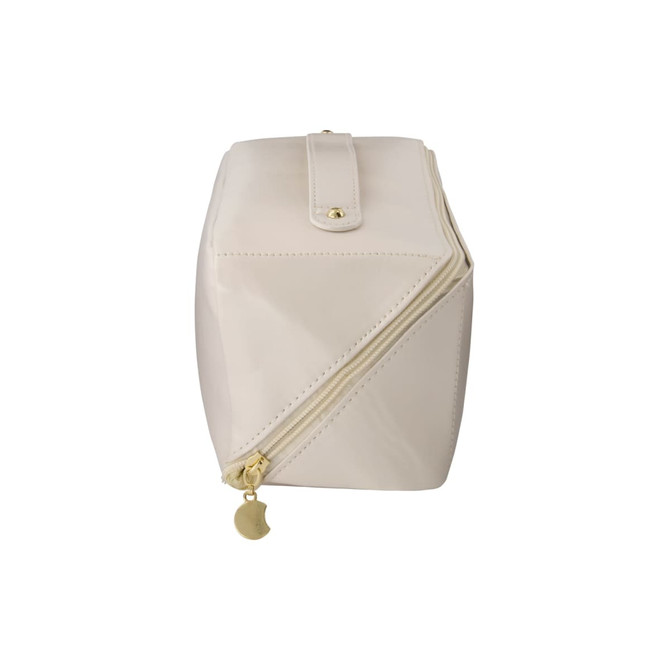 A cream-coloured toiletry bag with a gold zipper and button closure, featuring a logo on the exterior.