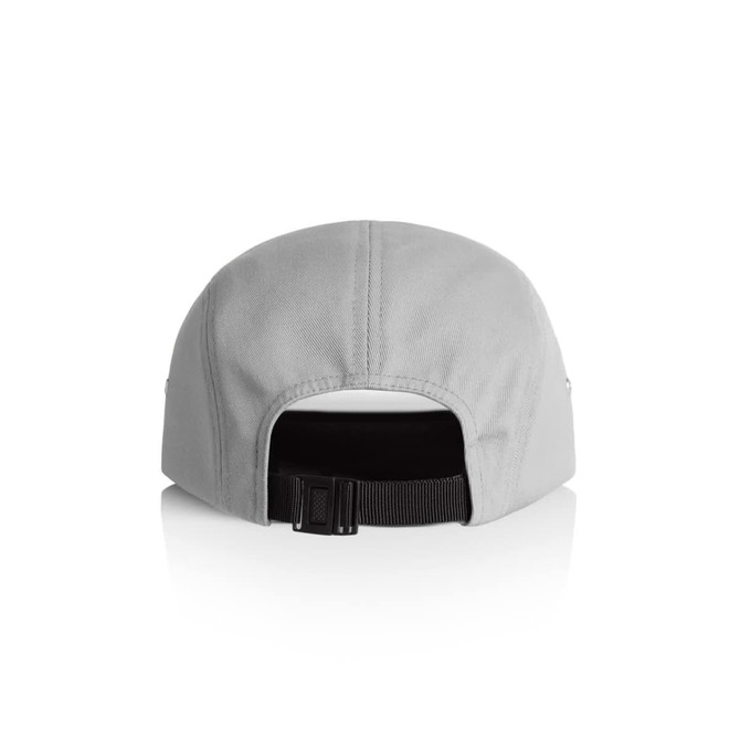 A grey five panel cap with a black adjustable strap at the back and a logo on the side.