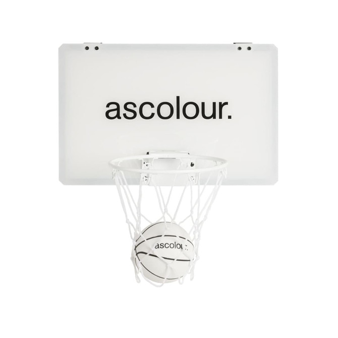 A mini basketball set with a white backboard and hoop, featuring a small white basketball. Includes branding.