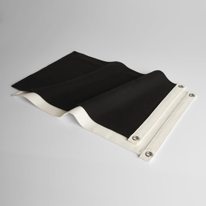 A black and white canvas flag with metal grommets for attachment, displayed on a neutral background.