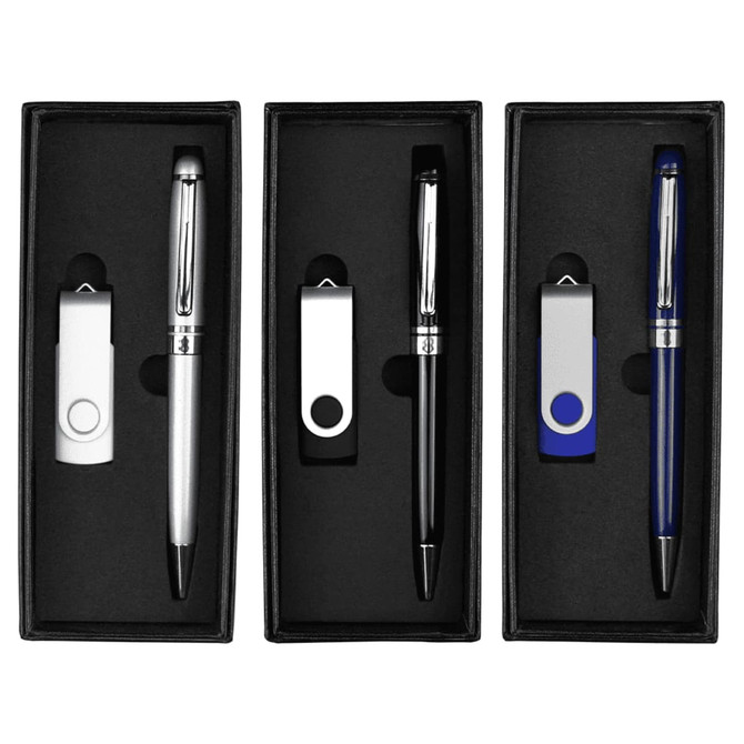 A gift set featuring three pens in silver, black, and blue, along with USB drives, all in elegant black packaging.