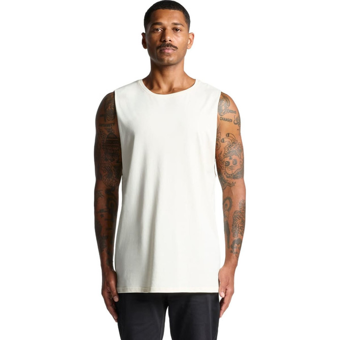 A sleeveless white tank top worn by a model with tattoos, featuring a logo but no visible text.