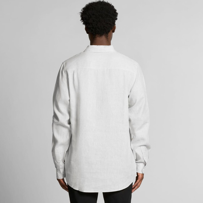 A white linen button-up shirt with long sleeves viewed from the back, featuring a logo on the back.