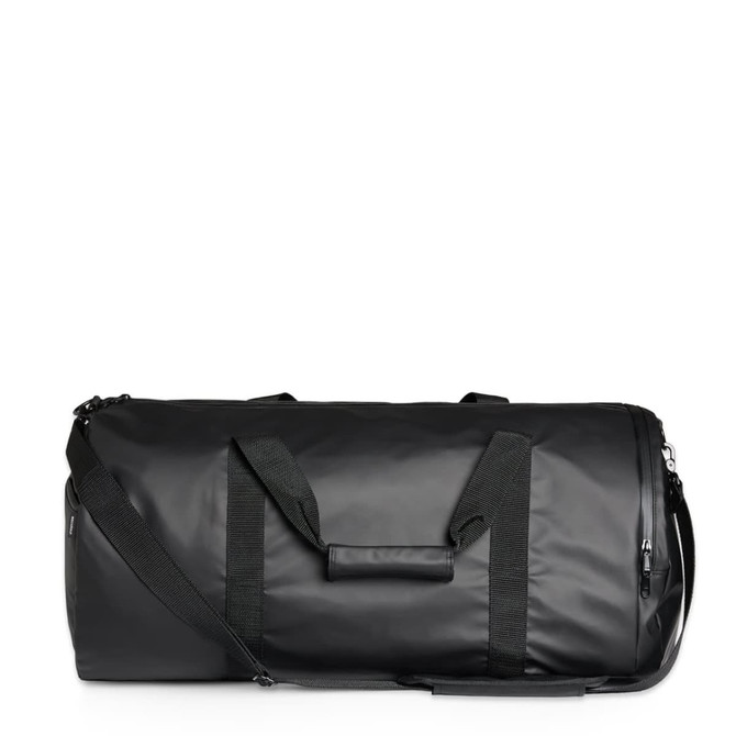 A black duffel bag with sturdy handles and a removable strap, featuring a waterproof material and a logo.