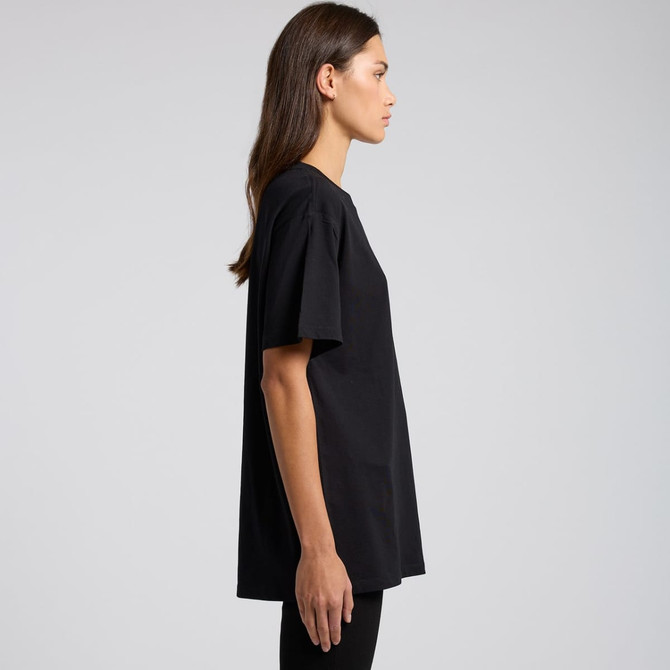 A black boyfriend tee displayed on a model from the side. The shirt has a relaxed fit and is short-sleeved.
