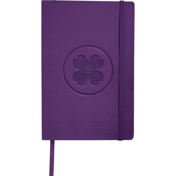 A purple soft bound journal with an embossed flower design and an elastic closure.