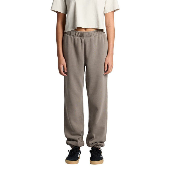 Faded track pants in grey, featuring a relaxed fit with elastic cuffs and waistband, modelled by a person.