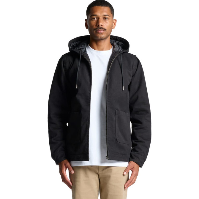 A man wearing a black canvas heavy hooded jacket with a lined interior and a front zip, featuring two pockets.