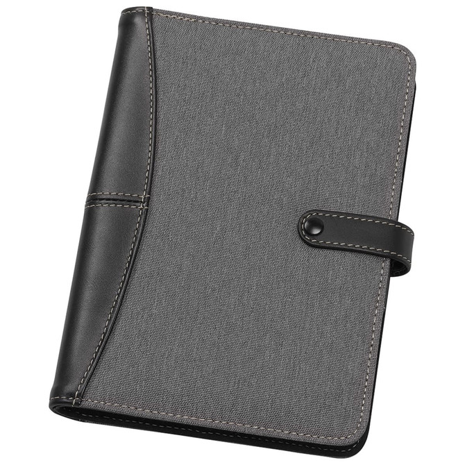 A5 journal cover in grey fabric with black leather accents and a fastening button. Features a logo on the cover.
