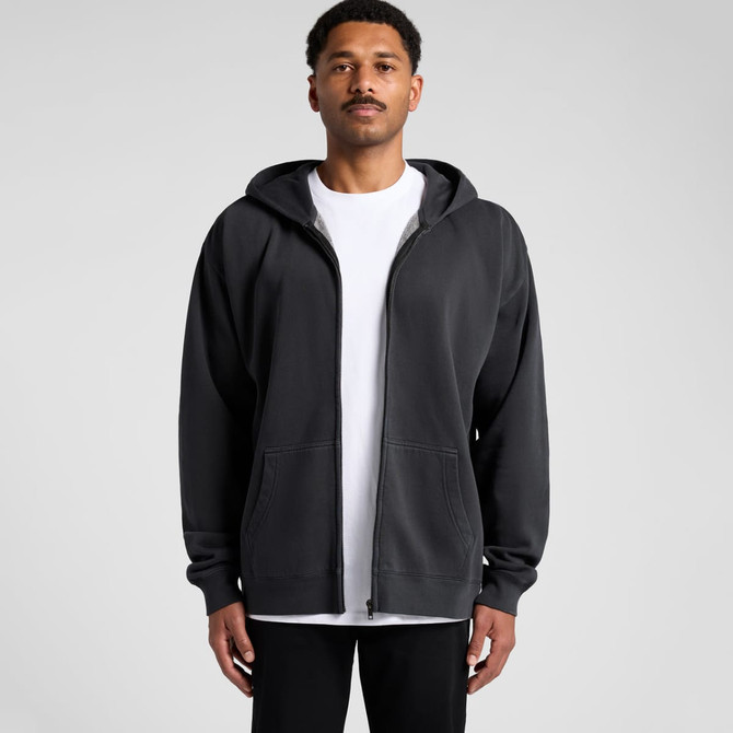 A black zip-up hoodie with a relaxed fit, featuring a hood and front pockets, displayed on a model.