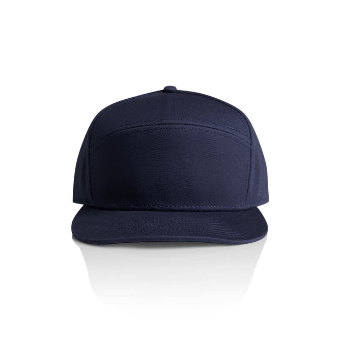 A navy 7-panel cap with a flat brim and a logo on the front.
