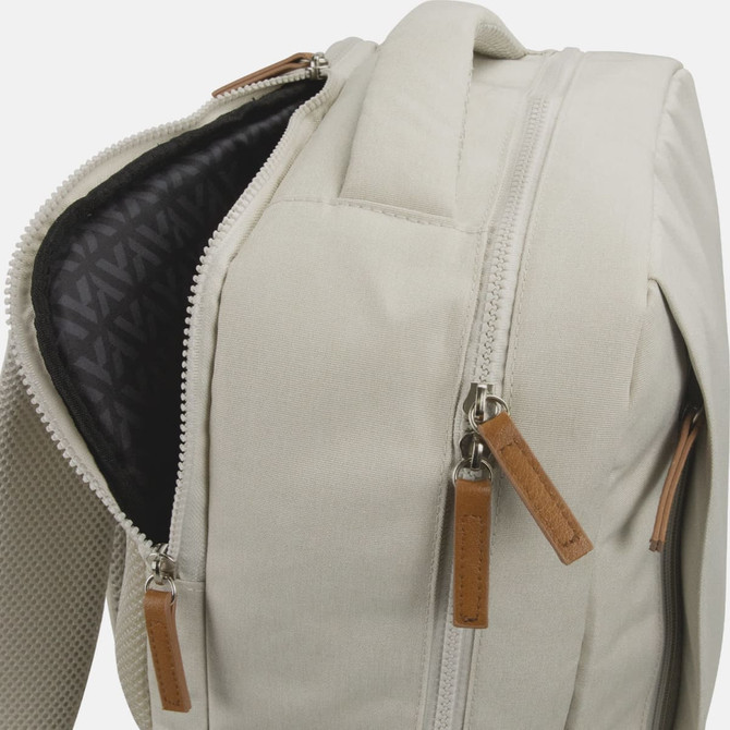 A cream-coloured backpack featuring dual zippers and a textured interior lining. It has a logo on the exterior.