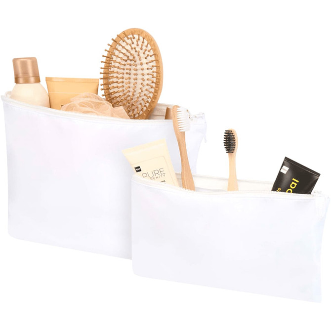 A set of two white toiletry bags containing a hairbrush, toothbrush, toiletries, and other grooming items.