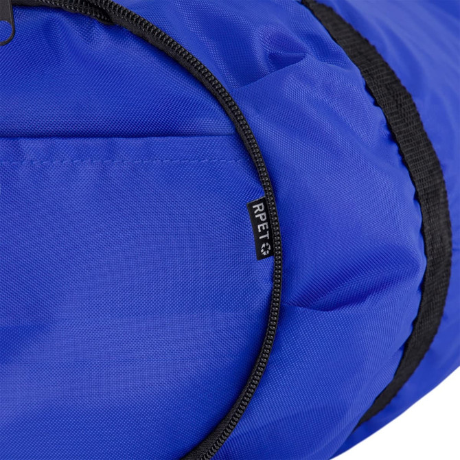 A blue duffle bag with a black zipper and a tag indicating material composition.
