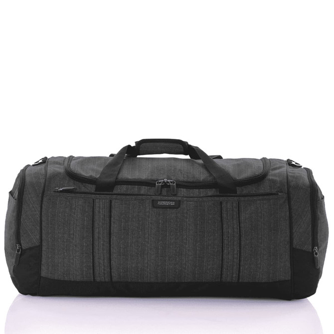 A grey duffle bag with black accents featuring multiple zippered pockets and sturdy handles.