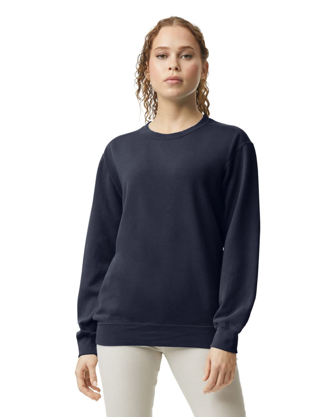A navy blue adult crewneck sweatshirt with long sleeves, featuring a subtle logo on the front.