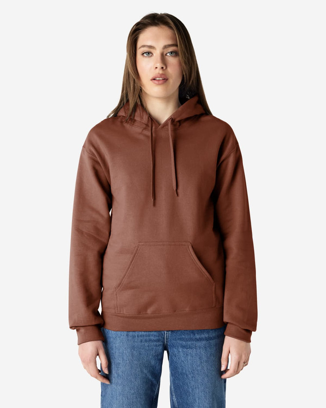 A brown Gildan Softstyle adult hooded sweatshirt worn by a woman, featuring a front pocket and drawstring hood.