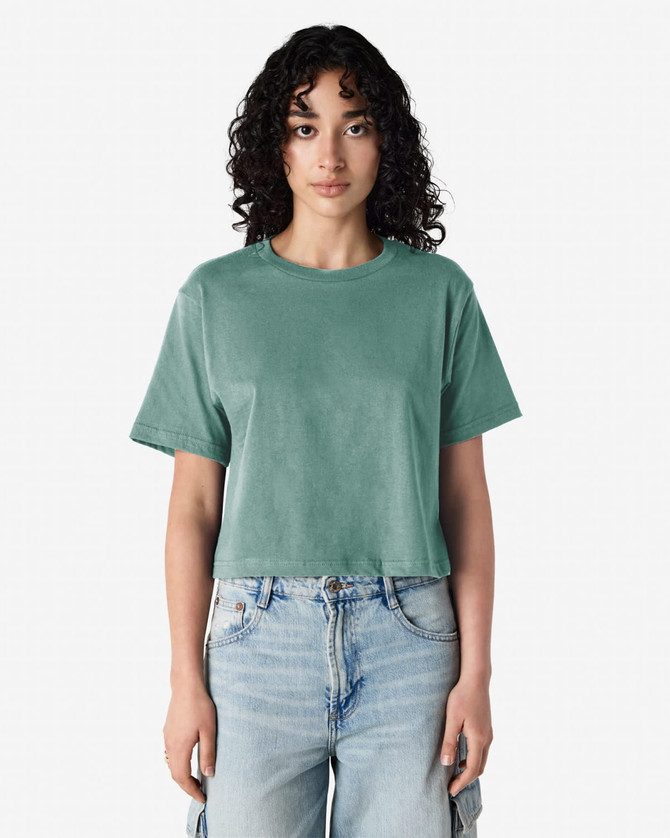 A women's boxy T-shirt in a soft green colour, featuring a classic crew neckline and short sleeves.