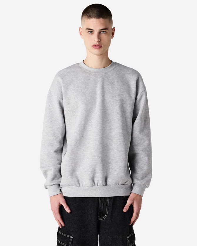 A unisex crewneck sweatshirt in light grey, featuring long sleeves and a comfortable fit. It has a branding logo.