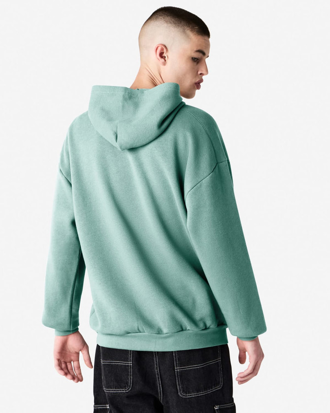 A unisex hooded sweatshirt in a soft green colour, featuring a spacious hood and a relaxed fit.