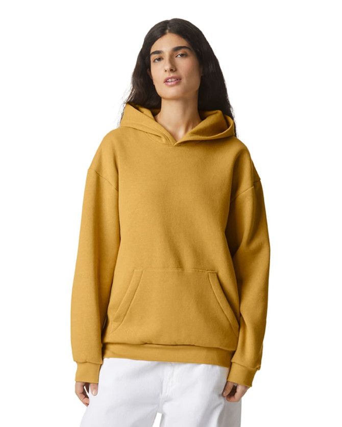 A unisex hooded sweatshirt in a warm gold colour, featuring a front pocket and a relaxed fit. It has a logo.