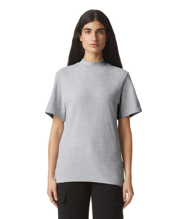 A grey unisex pique mockneck t-shirt with short sleeves and a logo.