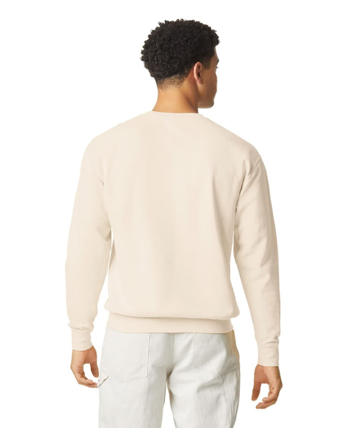A lightweight crewneck sweatshirt in a cream colour, featuring a classic design and a logo on the back.
