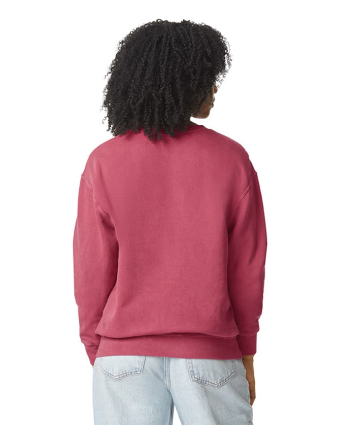 A lightweight crewneck sweatshirt in a rich burgundy colour, featuring a simple design and relaxed fit.