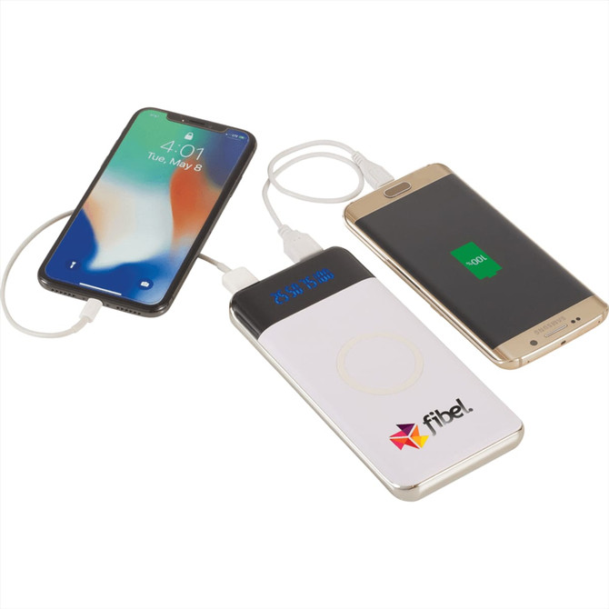 A wireless power bank in white colour with display, connected to two smartphones. It features a logo.